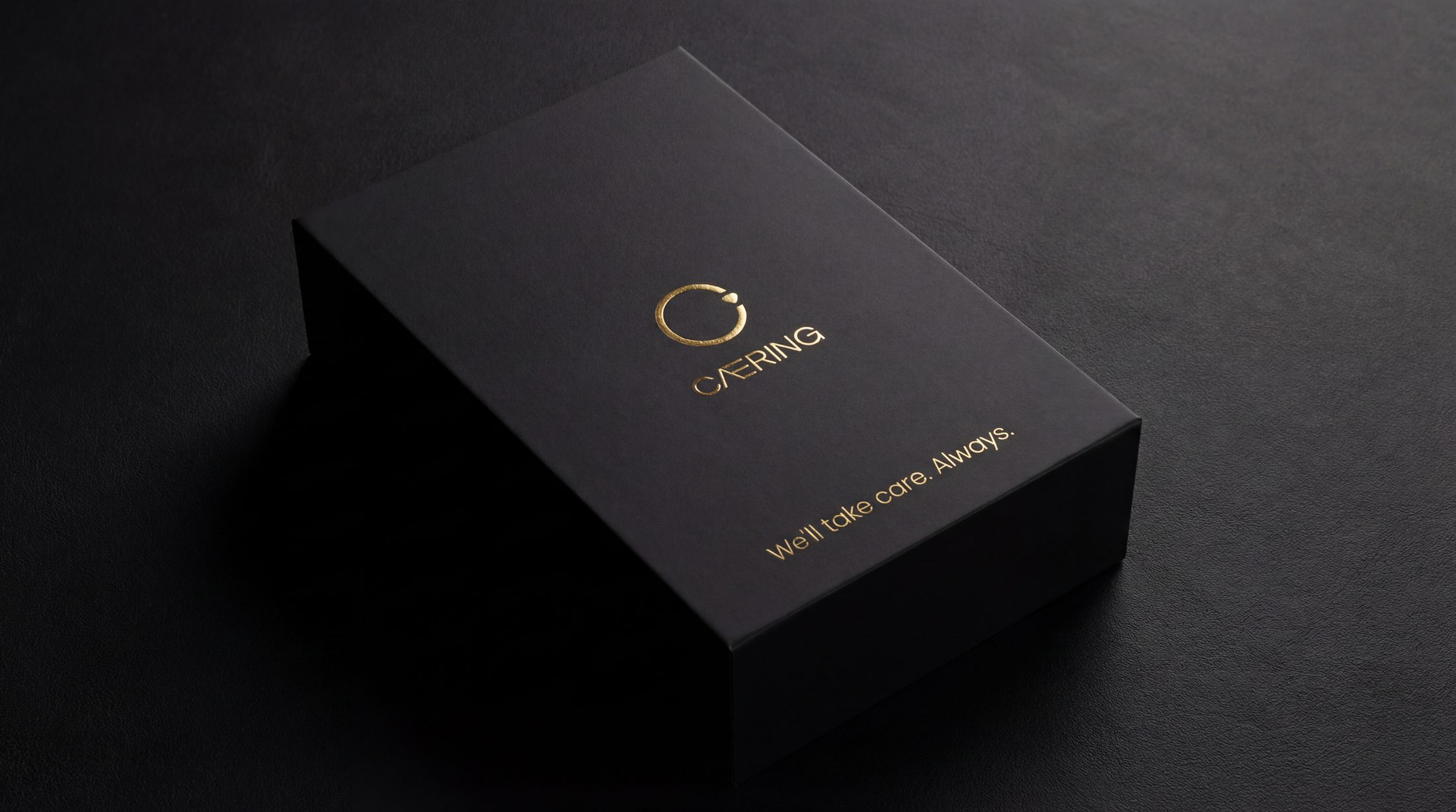 CAERING signature matte black keepsake box with gold foil mark